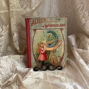 Vintage book of ALICES ADVENTURES IN WONDERLAND.